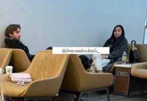 photo of two people at the airport