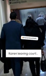 An image of Karen Huger walking away from the camera in the Montgomery County courthouse