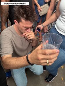 Tom Schwartz having trouble with a cocktail at an event in Dallas.