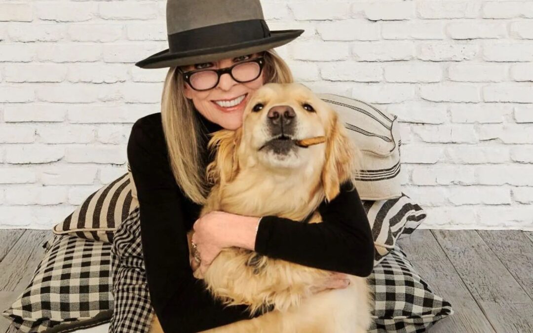 Diane Keaton posing with her dog, Reggie